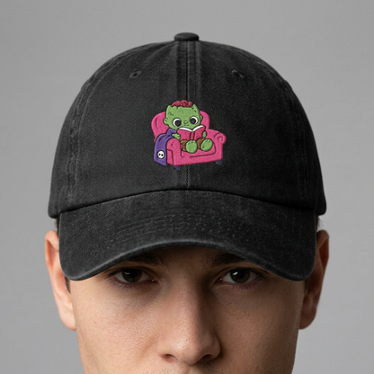 Cute Reading Zombie on Pink Armchair Embroidered Hat