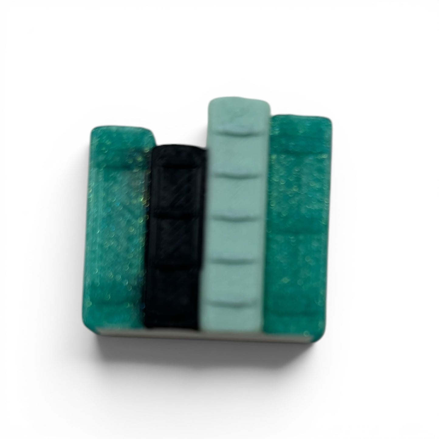 Swappable Clicker Toppers Customize Your Mini Bookshelf