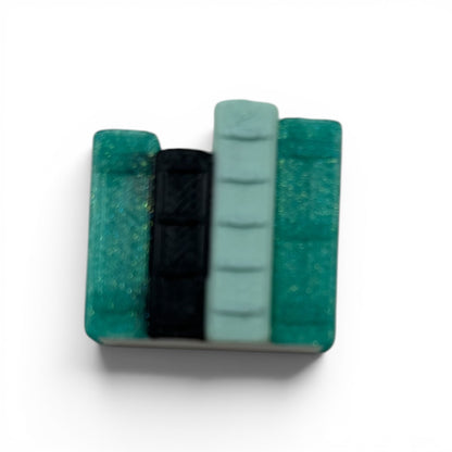 Swappable Clicker Toppers Customize Your Mini Bookshelf