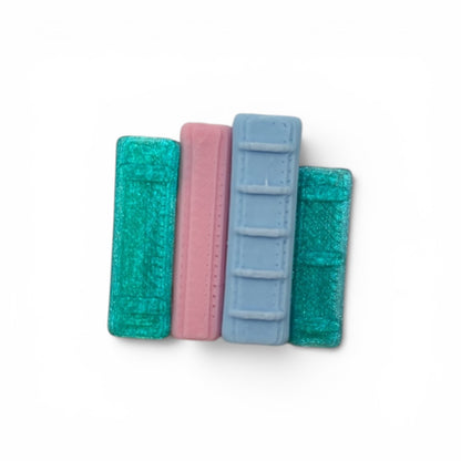 Swappable Clicker Toppers Customize Your Mini Bookshelf