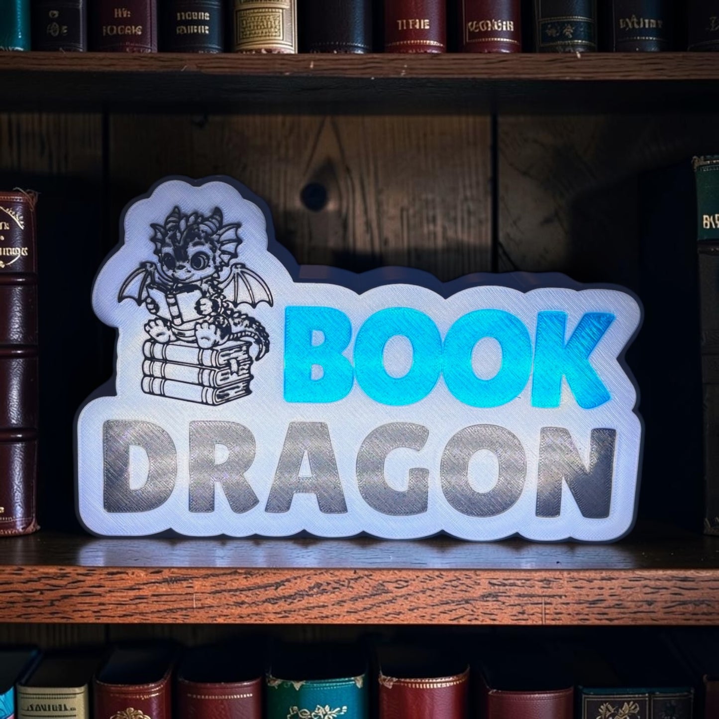 Book Dragon LED light box with white lights and push button power cord